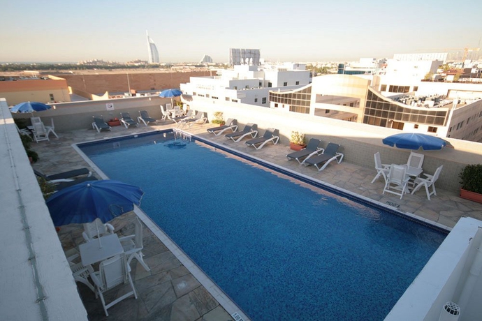Imagen de la piscina del Aparthotel Rose Garden Hotel Apartments Barsha. Foto 16