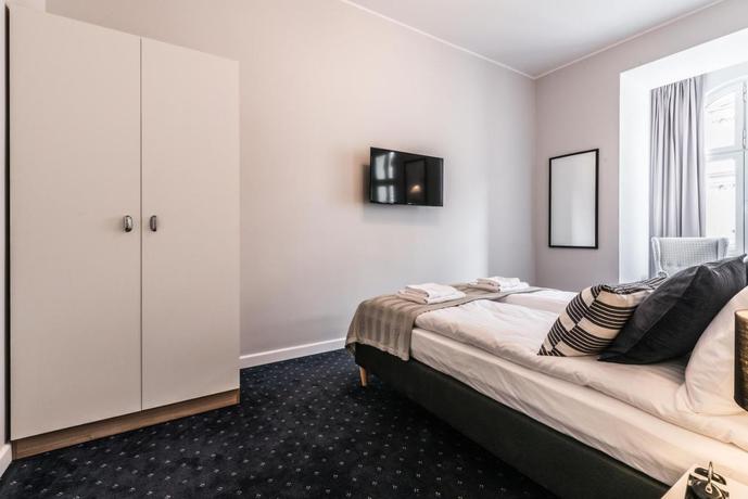 Imagen de la habitación del Aparthotel SERENITY Residence - Old Town Poznan. Foto 8
