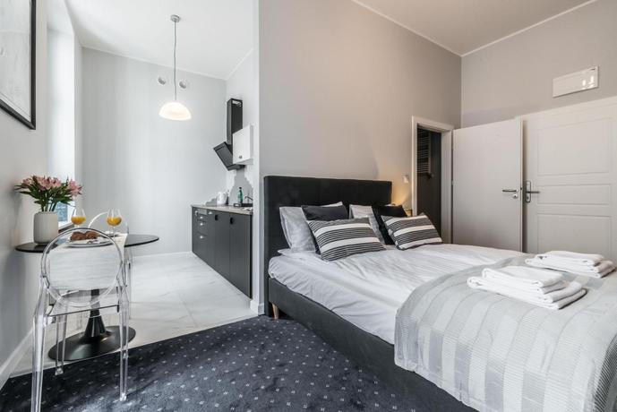 Imagen de la habitación del Aparthotel SERENITY Residence - Old Town Poznan. Foto 9