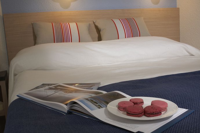 Imagen de la habitación del Aparthotel SOWELL R&Eacute;SIDENCES Le Port. Foto 7