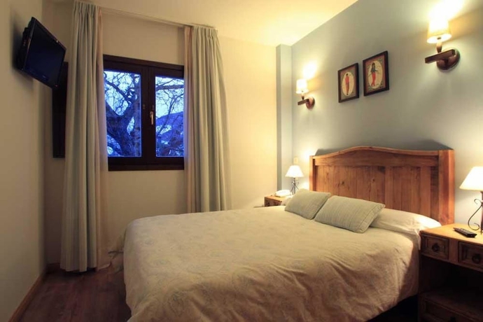 Imagen de la habitación del Aparthotel Sarrato. Foto 2