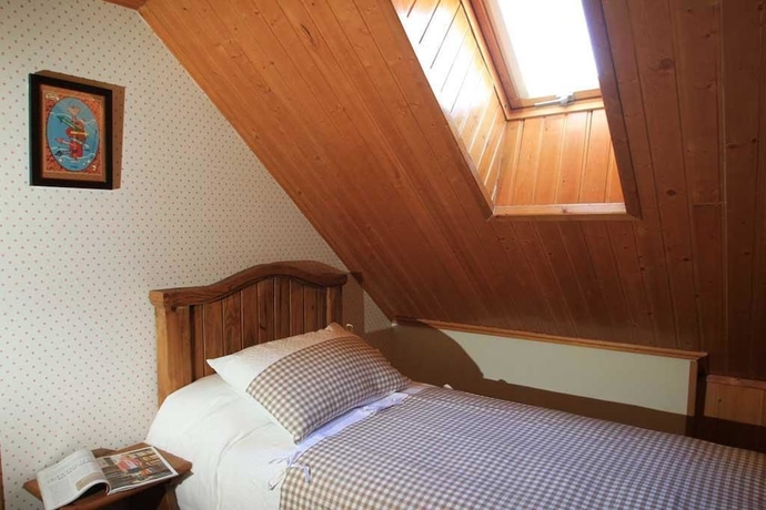 Imagen de la habitación del Aparthotel Sarrato. Foto 5