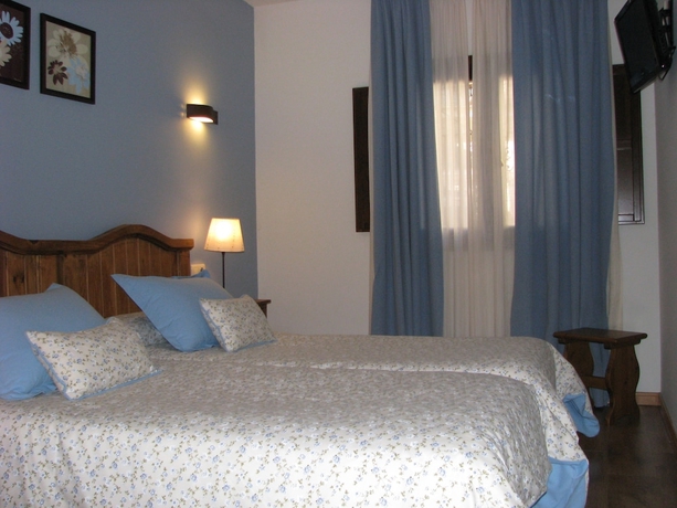 Imagen de la habitación del Aparthotel Sarrato. Foto 11