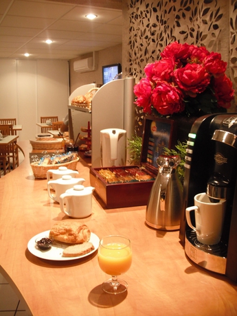 Imagen del bar/restaurante del Aparthotel S&eacute;jours Et Affaires Tours L&eacute;onard De Vinci. Foto 3