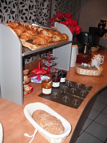 Imagen del bar/restaurante del Aparthotel S&eacute;jours Et Affaires Tours L&eacute;onard De Vinci. Foto 4