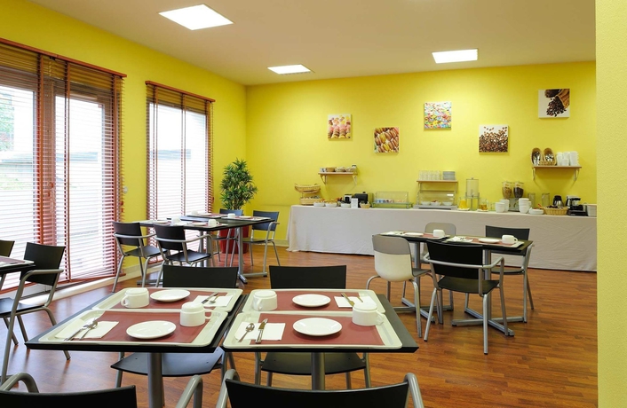 Imagen del bar/restaurante del Aparthotel S&eacute;jours and Affaires Lyon Park Lane. Foto 4