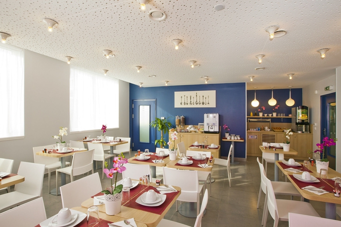 Imagen del bar/restaurante del Aparthotel S&eacute;jours and Affaires Massy Atlantis. Foto 2