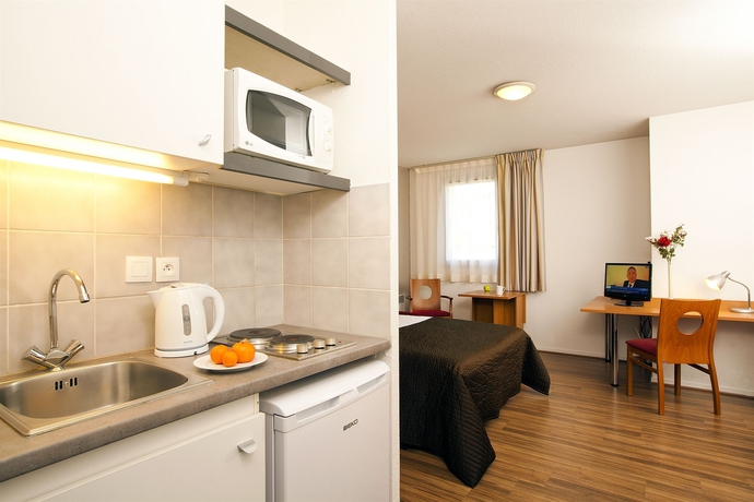 Imagen de la habitación del Aparthotel Sejours and Affaires Toulouse De Brienne. Foto 10