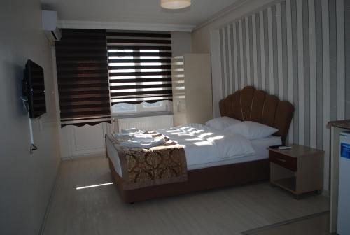 Imagen de la habitación del Aparthotel Selimiye Palace. Foto 7