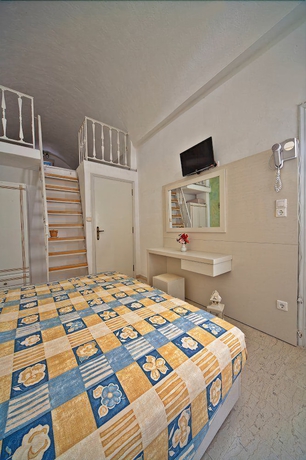 Imagen de la habitación del Aparthotel Sellada Apartments. Foto 7