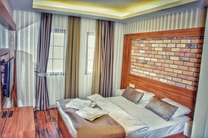Imagen de la habitación del Aparthotel Serah. Foto 17