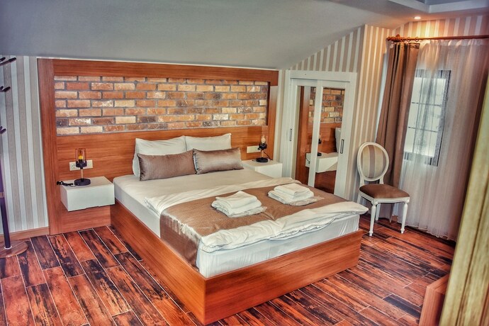 Imagen de la habitación del Aparthotel Serah. Foto 18