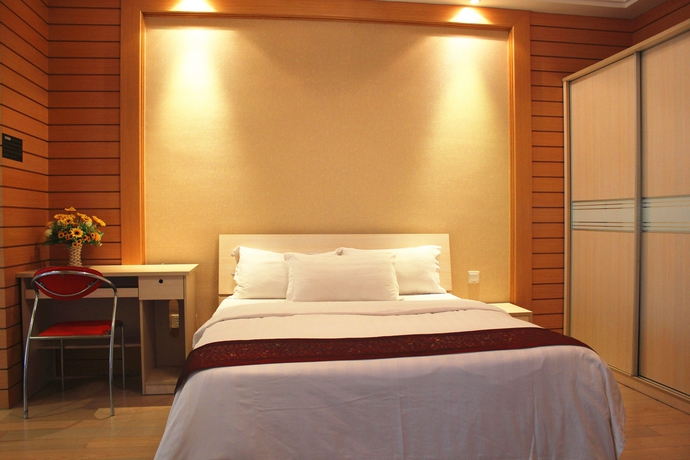 Imagen de los interiores del Aparthotel She and He Service Apartment - Huifeng. Foto 11