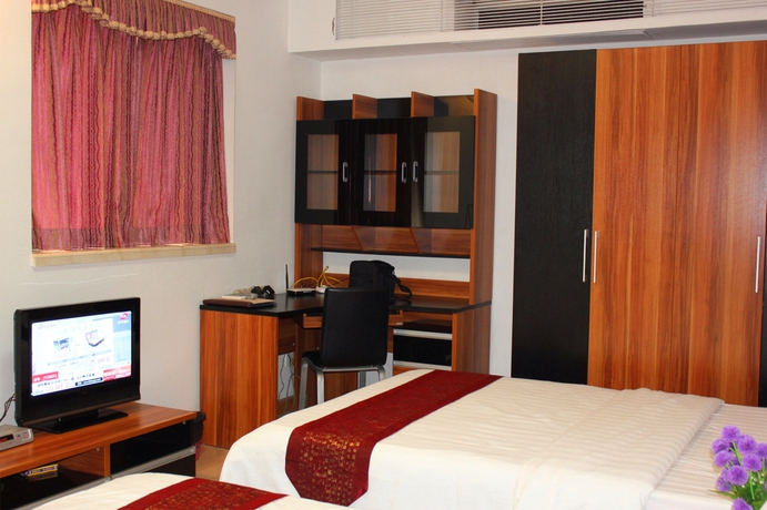 Imagen de los interiores del Aparthotel She and He Service Apartment - Huifeng. Foto 12