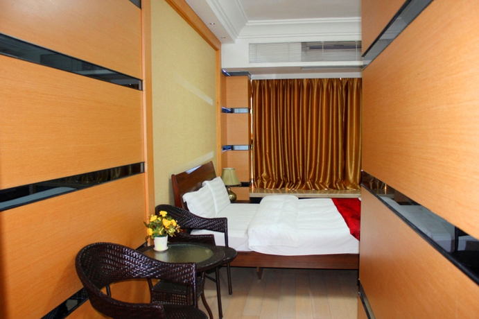 Imagen de la habitación del Aparthotel She and He Service Apartment - Huifeng. Foto 7