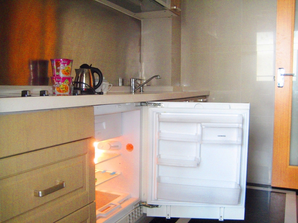 Imagen de la habitación del Aparthotel She and He Service Apartment - Huifeng. Foto 9