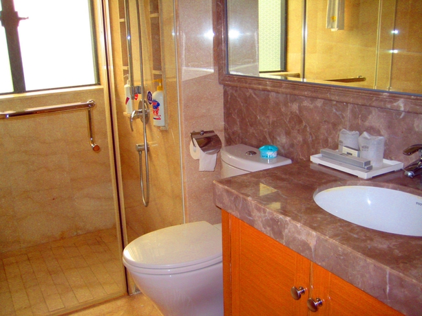Imagen de la habitación del Aparthotel She and He Service Apartment - Huifeng. Foto 10