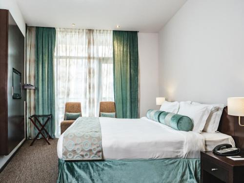 Imagen de la habitación del Aparthotel Signature Hotel Apartments and Spa. Foto 12