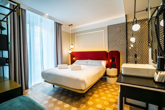 Imagen de la habitación del Aparthotel SmartRental Collection Gran V&iacute;a Capital. Foto 3