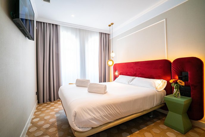 Imagen de la habitación del Aparthotel SmartRental Collection Gran V&iacute;a Capital. Foto 8