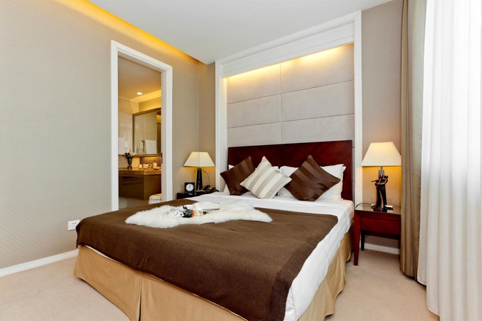 Imagen de la habitación del Aparthotel Somerset Emerald City Suzhou. Foto 8