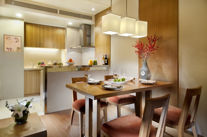 Imagen de los interiores del Aparthotel Somerset International Building Tianjin. Foto 15