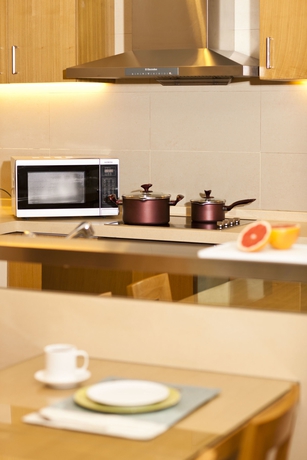 Imagen de la habitación del Aparthotel Somerset International Building Tianjin. Foto 4