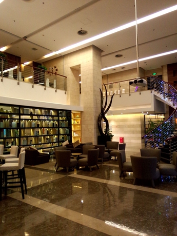 Imagen de los interiores del Aparthotel Somerset Jiefangbei. Foto 12