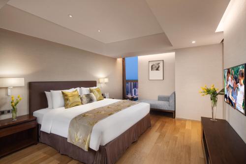 Imagen de la habitación del Aparthotel Somerset Xindicheng Xi'an. Foto 8