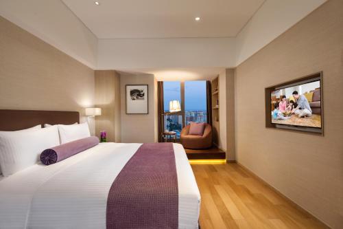 Imagen de la habitación del Aparthotel Somerset Xindicheng Xi'an. Foto 9