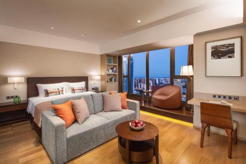 Imagen de la habitación del Aparthotel Somerset Xindicheng Xi'an. Foto 10