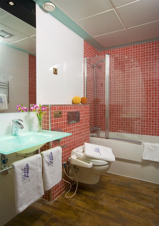 Imagen de la habitación del Aparthotel Suites Gran Via 44. Foto 2