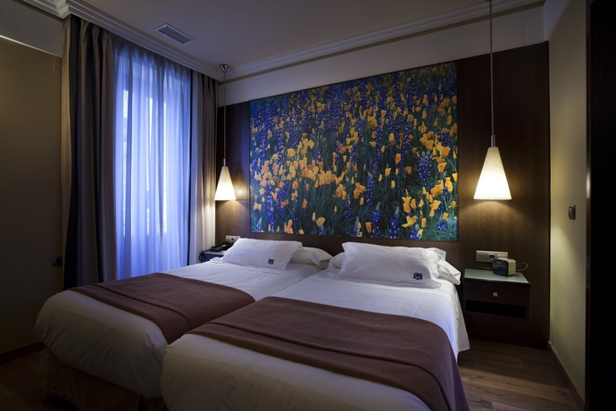 Imagen de la habitación del Aparthotel Suites Gran Via 44. Foto 7