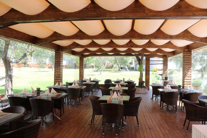 Imagen del bar/restaurante del Aparthotel Sun Village Apartments. Foto 4