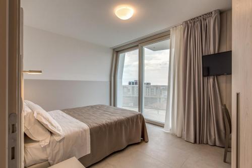 Imagen de la habitación del Aparthotel Sunrise Palace, Lido Di Jesolo. Foto 4