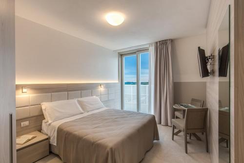 Imagen de la habitación del Aparthotel Sunrise Palace, Lido Di Jesolo. Foto 9