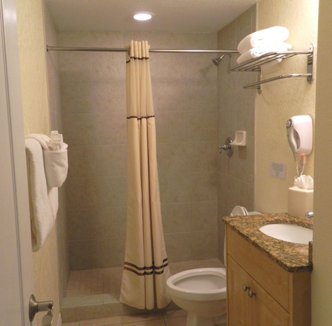 Imagen de la habitación del Aparthotel Sunset Vistas Two Bedroom Beachfront Suites. Foto 3