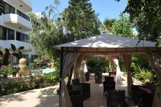 Imagen de la habitación del Aparthotel Tasiana. Foto 4