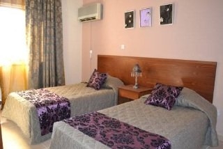 Imagen de la habitación del Aparthotel Tasiana. Foto 5