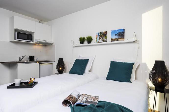 Imagen de la habitación del Aparthotel T&eacute;n&eacute;o Apparthotel Bordeaux Maritime. Foto 4