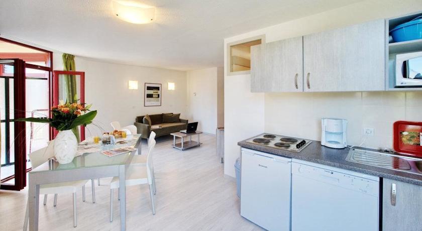 Imagen de la habitación del Aparthotel Terres De France - Appart Hotel Le Splendid. Foto 4