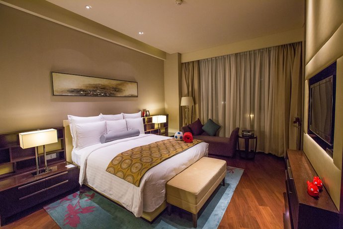 Imagen de la habitación del Aparthotel The Lakeview, Tianjin Marriott Executive Apartments. Foto 5