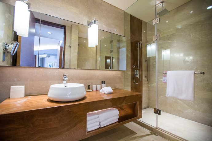 Imagen de la habitación del Aparthotel The Lakeview, Tianjin Marriott Executive Apartments. Foto 6