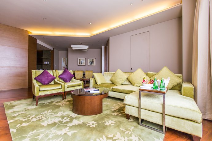Imagen de la habitación del Aparthotel The Lakeview, Tianjin Marriott Executive Apartments. Foto 7