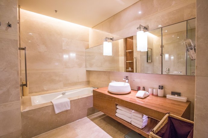 Imagen de la habitación del Aparthotel The Lakeview, Tianjin Marriott Executive Apartments. Foto 10