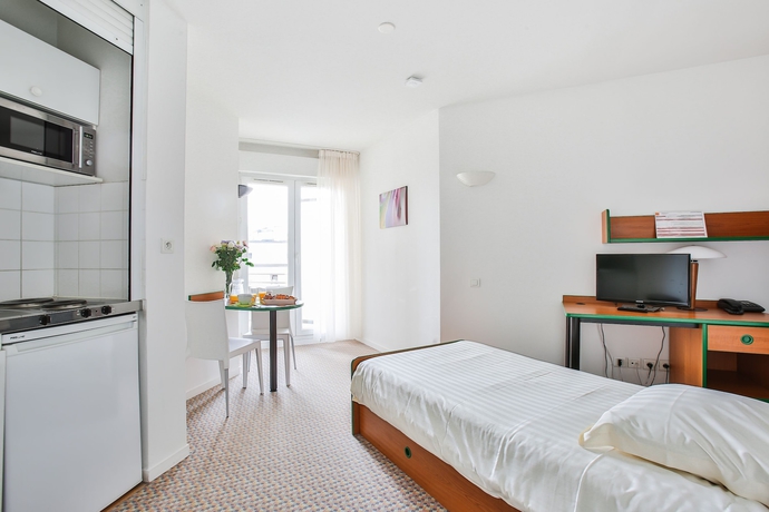 Imagen de la habitación del Aparthotel The Originals R&eacute;sidence, Les Laur&eacute;ades, Clermont-Ferrand. Foto 10