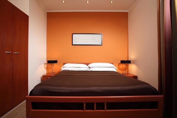 Imagen de la habitación del Aparthotel Trianon Borgo Pio. Foto 5