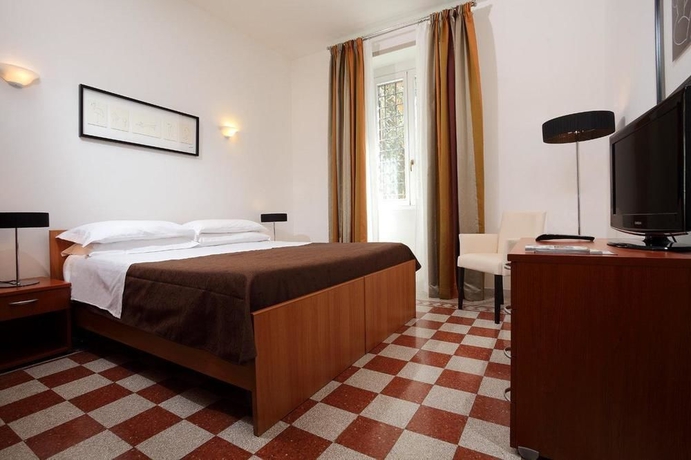 Imagen de la habitación del Aparthotel Trianon Borgo Pio. Foto 6