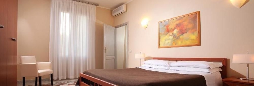 Imagen de la habitación del Aparthotel Trianon Borgo Pio. Foto 8