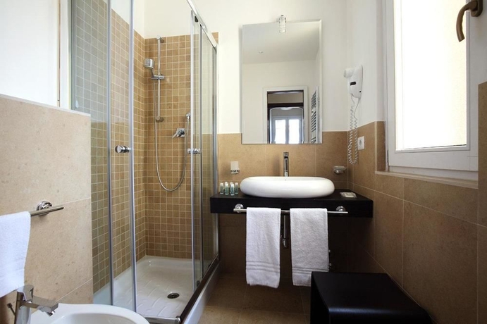 Imagen de la habitación del Aparthotel Trianon Borgo Pio. Foto 9